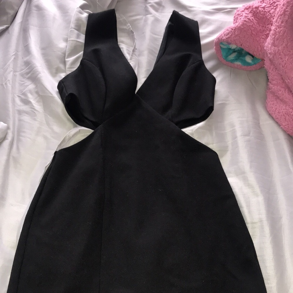 Black mini dress with small slit